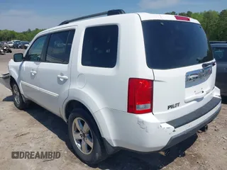 2009 Honda Pilot EX-L with VIN 5FNYF48619B022699, listed as a IAAI auction lot 42016173 with 204,190 mi miles and . Bid and sale history available at carsss.com. Image 3.