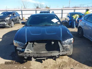 2014 Dodge Charger SE with VIN 2C3CDXBG9EH116776, listed as a IAAI auction lot 41465565 with 128,319 mi miles. Bid and sale history available at carsss.com. Image 13.