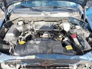 2004 Dodge Dakota Sport with VIN 1D7HL38K84S573410, listed as a IAAI auction lot 41495481 with 218,866 mi miles. Bid and sale history available at carsss.com. Image 10.