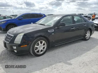 2009 Cadillac STS RWD z VIN 1G6DW67V690134595, wystawiony jako Copart lot #76619544 z przebiegiem Nie podano mil oraz Szkoda całkowita • Salvage title. Historia ofert i sprzedaży dostępna na DreamBid. Obrazek 1.