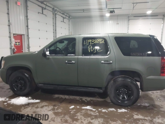 2014 Chevrolet Tahoe Commercial with VIN 1GNSK2E05ER196941, listed as a IAAI auction lot 41938892 with 176,170 mi miles and . Bid and sale history available at DreamBid. Image 15.