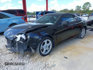 2006 Hyundai Tiburon GT z VIN KMHHN65F56U224768, wystawiony jako IAAI lot #40672721 z przebiegiem 158 535 mil mil oraz . Historia ofert i sprzedaży dostępna na DreamBid. Obrazek 18.