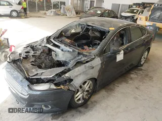 2014 Ford Fusion SE with VIN 3FA6P0HD9ER171307, listed as a IAAI auction lot 41582707 with Not Provided miles and . Bid and sale history available at DreamBid. Image 6.
