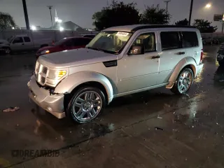 2011 Dodge Nitro Heat with VIN 1D4PT4GX5BW606817, listed as a Copart auction lot 79884054 with 91,390 mi miles and Salvage Title. Bid and sale history available at DreamBid. Image 1.