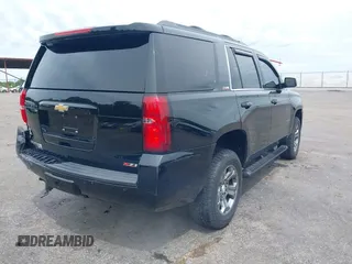 2017 Chevrolet Tahoe LT z VIN 1GNSKBKC8HR311969, wystawiony jako IAAI lot #42126414 z przebiegiem 160 994 mil mil oraz . Historia ofert i sprzedaży dostępna na DreamBid. Obrazek 4.