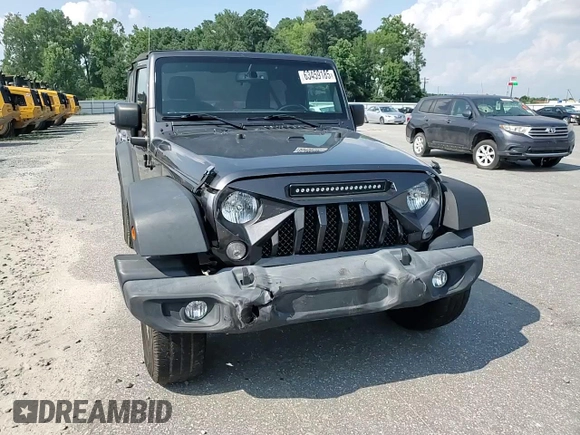 2017 Jeep Wrangler Sport with VIN 1C4AJWAG9HL721332, listed as a Copart auction lot 63459185 with 143,608 mi miles and Salvage title. Bid and sale history available at DreamBid. Image 13.