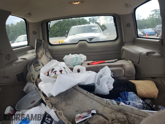 2005 Chevrolet Tahoe LS with VIN 1GNEC13V25R187388, listed as a Copart auction lot 61913465 with 198,657 mi miles and Salvage title. Bid and sale history available at DreamBid. Image 10.