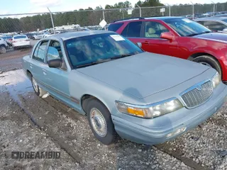1996 Mercury Grand Marquis GS with VIN 2MELM74W7TX616694, listed as a IAAI auction lot 41216582 with 127,486 mi miles and . Bid and sale history available at DreamBid. Image 1.