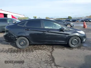 2013 Ford Fiesta S z VIN 3FADP4AJ7DM178265, wystawiony jako IAAI lot #41610346 z przebiegiem 115 963 mil mil oraz . Historia ofert i sprzedaży dostępna na DreamBid. Obrazek 13.