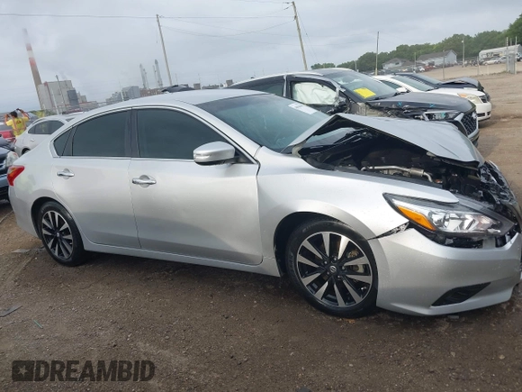 2018 Nissan Altima SR with VIN 1N4AL3AP6JC151861, listed as a IAAI auction lot 40010666 with 140,228 mi miles and . Bid and sale history available at DreamBid. Image 13.