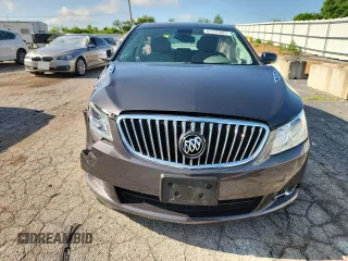 2013 Buick LaCrosse Touring с VIN 1G4GJ5E32DF245263, выставлен на аукционе Copart как лот 61476805 с пробегом 38 048 миль миль и Списание • Salvage title. История ставок и продаж доступна на DreamBid. Изображение 5.