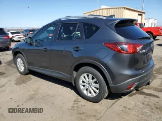 2014 Mazda CX-5 Touring with VIN JM3KE2CY7E0366690, listed as a Copart auction lot 50783635 with 127,853 mi miles and Salvage Title. Bid and sale history available at carsss.com. Image 2.