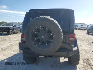 2015 Jeep Wrangler Unlimited Rubicon Hard Rock with VIN 1C4HJWFG1FL710264, listed as a Copart auction lot 47563975 with 96,737 mi miles and Salvage title. Bid and sale history available at DreamBid. Image 6.
