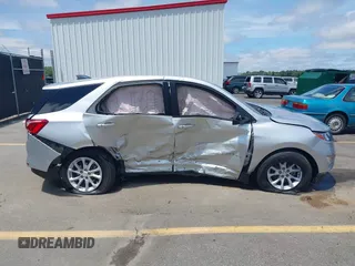 2021 Chevrolet Equinox LS with VIN 3GNAXHEV4MS107223, listed as a IAAI auction lot 42346814 with 71,162 mi miles and . Bid and sale history available at DreamBid. Image 13.