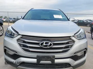 2017 Hyundai Santa Fe 2.4L with VIN 5XYZU3LB4HG464876, listed as a IAAI auction lot 42693100 with 127,888 mi miles and . Bid and sale history available at DreamBid. Image 12.