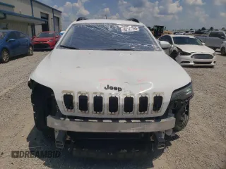 2019 Jeep Cherokee Latitude Plus z VIN 1C4PJLLB5KD406667, wystawiony jako Copart lot #62177795 z przebiegiem 131 822 mil mil oraz Szkoda całkowita • Salvage title. Historia ofert i sprzedaży dostępna na DreamBid. Obrazek 5.