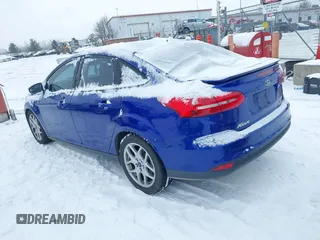 2015 Ford Focus SE with VIN 1FADP3F23FL361274, listed as a IAAI auction lot 41292796 with 102,741 mi miles. Bid and sale history available at carsss.com. Image 3.