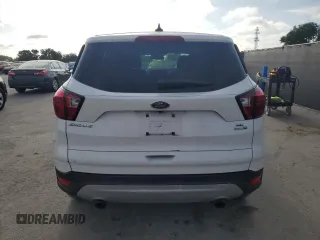 2019 Ford Escape SE z VIN 1FMCU9GD9KUA02481, wystawiony jako Copart lot #57919925 z przebiegiem 63 874 mil mil oraz Czysty tytuł • Clean title. Historia ofert i sprzedaży dostępna na DreamBid. Obrazek 6.