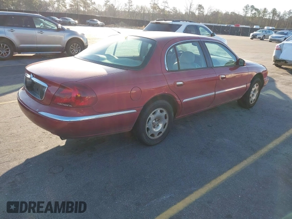 1999 Lincoln Continental with VIN 1LNHM97V8XY633821, listed as a IAAI auction lot 41769620 with 268,617 mi miles and . Bid and sale history available at DreamBid. Image 4.