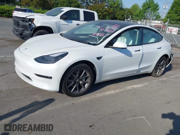 2023 Tesla Model 3 z VIN 5YJ3E1EA3PF600030, wystawiony jako IAAI lot #42052459 z przebiegiem 11 177 mil mil oraz . Historia ofert i sprzedaży dostępna na DreamBid. Obrazek 2.