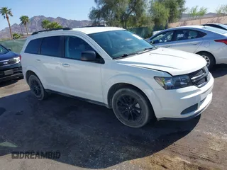 2020 Dodge Journey SE Value with VIN 3C4PDCAB2LT273467, listed as a IAAI auction lot 42001467 with 67,267 mi miles and . Bid and sale history available at carsss.com. Image 1.
