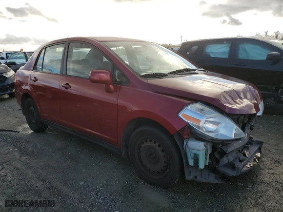 2010 Nissan Versa 1.8 S with VIN 3N1BC1AP7AL422548, listed as a Copart auction lot 86725104 with 165,947 mi miles and Salvage Title. Bid and sale history available at carsss.com. Image 4.