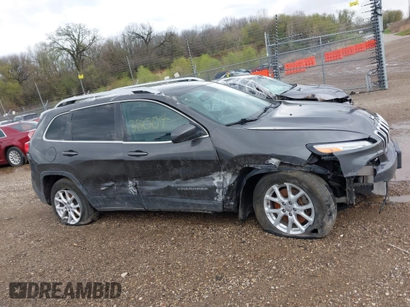 2014 Jeep Cherokee Altitude with VIN 1C4PJMCB2EW181848, listed as a IAAI auction lot 41638004 with 175,813 mi miles. Bid and sale history available at carsss.com. Image 13.
