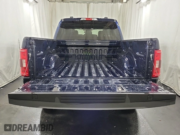 2023 Ford F-150 XL with VIN 1FTFW1E81PFB69495, listed as a IAAI auction lot 42141853 with 19,823 mi miles. Bid and sale history available at carsss.com. Image 1.