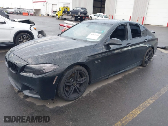 2015 BMW 5 Series 535i with VIN WBA5B1C51FG125924, listed as a IAAI auction lot 41060431 with 102,957 mi miles and . Bid and sale history available at carsss.com. Image 2.