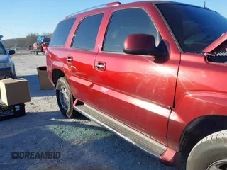 2003 Cadillac Escalade z VIN 1GYEC63T63R132602, wystawiony jako IAAI lot #41778576 z przebiegiem 242 443 mil mil oraz . Historia ofert i sprzedaży dostępna na DreamBid. Obrazek 14.