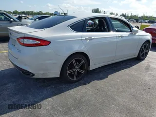 2014 Ford Fusion Titanium with VIN 3FA6P0K90ER172690, listed as a IAAI auction lot 42697162 with Not provided miles and . Bid and sale history available at DreamBid. Image 4.
