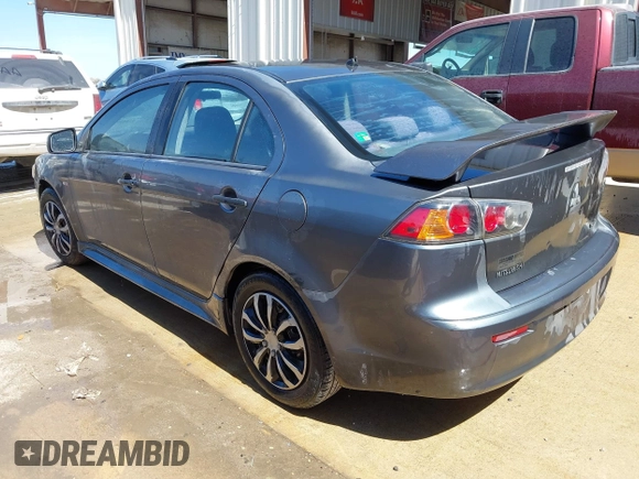 2010 Mitsubishi Lancer DE with VIN JA32U1FU1AU033241, listed as a IAAI auction lot 41805976 with 214,606 mi miles. Bid and sale history available at carsss.com. Image 3.