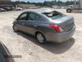 2012 Nissan Versa SV with VIN 3N1CN7AP1CL811531, listed as a IAAI auction lot 40465017 with 173,736 mi miles and . Bid and sale history available at DreamBid. Image 3.