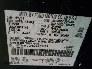 2002 Ford F-250 XL with VIN 1FTNW20F52EA52699, listed as a Copart auction lot 84088814 with 299,869 mi miles and Salvage Title. Bid and sale history available at DreamBid. Image 12.