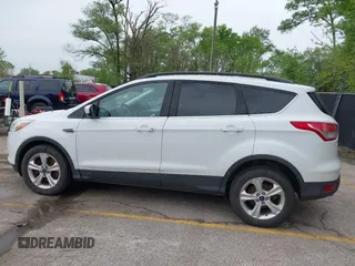 2016 Ford Escape SE with VIN 1FMCU9GX1GUC04085, listed as a IAAI auction lot 42126826 with 130,728 mi miles. Bid and sale history available at carsss.com. Image 14.