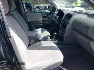 2006 Hyundai Santa Fe GLS with VIN KM8SC13D16U094777, listed as a IAAI auction lot 41803425 with 156,130 mi miles. Bid and sale history available at carsss.com. Image 5.