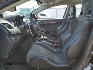 2008 Mitsubishi Lancer Evolution MR with VIN JA3AW56V18U050699, listed as a Copart auction lot 58567274 with 79,267 mi miles and Salvage Title. Bid and sale history available at DreamBid. Image 7.