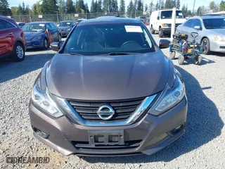 2017 Nissan Altima 2.5 SR with VIN 1N4AL3AP8HC180059, listed as a IAAI auction lot 42075133 with 197,955 mi miles. Bid and sale history available at carsss.com. Image 12.