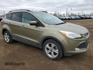2014 Ford Escape SE with VIN 1FMCU9GX3EUB50432, listed as a Copart auction lot 50922755 with 276,474 mi miles and Clean Title. Bid and sale history available at DreamBid. Image 4.