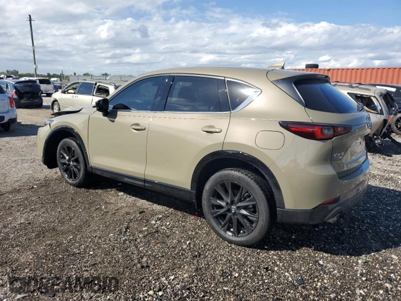 2024 Mazda CX-5 2.5 Carbon Turbo with VIN JM3KFBAYXR0521660, listed as a Copart auction lot 42415895 with 4,857 mi miles and Clean Title. Bid and sale history available at carsss.com. Image 2.