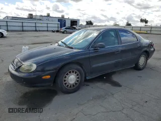 1997 Mercury Sable GS with VIN 1MELM50U1VA620597, listed as a Copart auction lot 51635765 with 250,824 mi miles and Salvage Title. Bid and sale history available at carsss.com. Image 1.