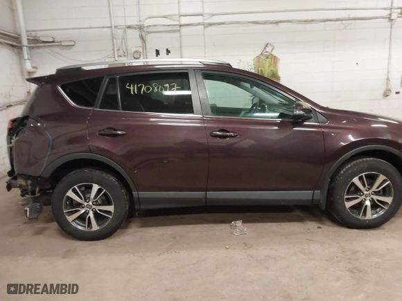 2017 Toyota RAV4 XLE with VIN 2T3RFREV3HW679851, listed as a IAAI auction lot 41708097 with 128,482 mi miles. Bid and sale history available at carsss.com. Image 14.