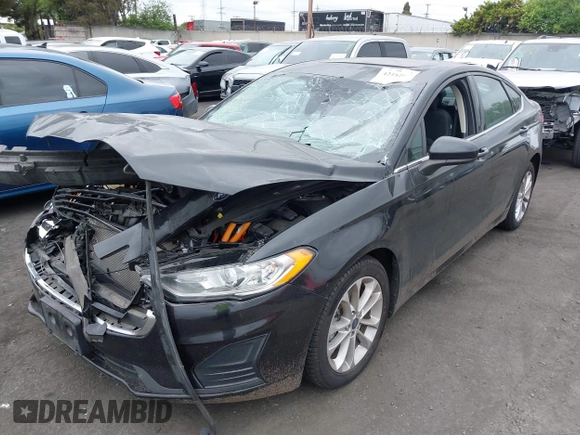 2020 Ford Fusion SE with VIN 3FA6P0LU9LR140840, listed as a IAAI auction lot 42182056 with 35,542 mi miles and . Bid and sale history available at DreamBid. Image 2.