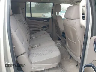 2015 GMC Yukon XL SLE z VIN 1GKS1GKC1FR155056, wystawiony jako IAAI lot #41517607 z przebiegiem 174 634 mil mil oraz . Historia ofert i sprzedaży dostępna na DreamBid. Obrazek 8.