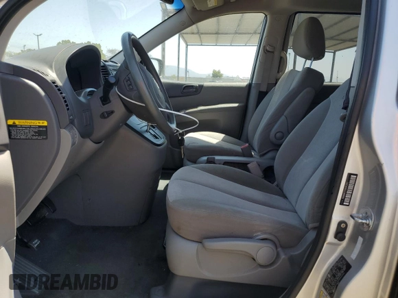 2012 Kia Sedona LX with VIN KNDMG4C72C6445242, listed as a Copart auction lot 54164455 with 143,124 mi miles and Salvage Title. Bid and sale history available at carsss.com. Image 7.