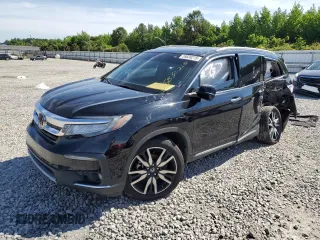 2021 Honda Pilot Touring 8-Passenger with VIN 5FNYF5H93MB009669, listed as a Copart auction lot 55830215 with 104,207 mi miles and Salvage title. Bid and sale history available at DreamBid. Image 1.
