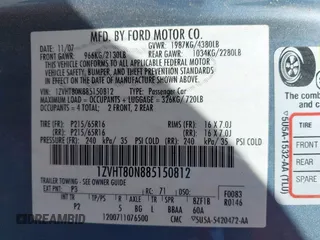 2008 Ford Mustang Deluxe z VIN 1ZVHT80N885150812, wystawiony jako IAAI lot #42428608 z przebiegiem 128 804 mil mil oraz . Historia ofert i sprzedaży dostępna na DreamBid. Obrazek 9.