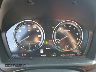 2021 BMW X1 sDrive28i with VIN WBXJG7C0XM5S33884, listed as a Copart auction lot 48413405 with 89,698 mi miles and Salvage Title. Bid and sale history available at DreamBid. Image 9.