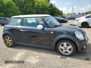 2011 MINI Hardtop with VIN WMWSU3C51BT183638, listed as a Copart auction lot 62762925 with Not provided miles and Non repairable. Bid and sale history available at DreamBid. Image 4.