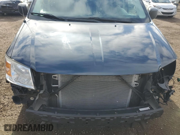 2009 Dodge Grand Caravan SE with VIN 2D8HN44EX9R530854, listed as a Copart auction lot 82131104 with 161,933 mi miles and Salvage title. Bid and sale history available at DreamBid. Image 12.